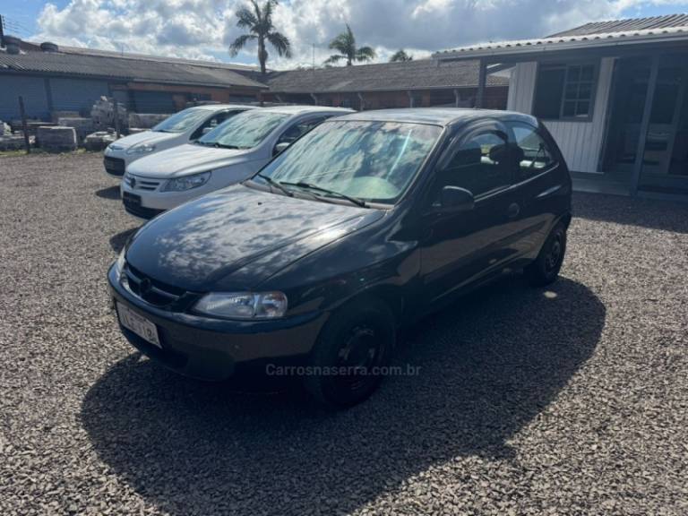 CHEVROLET - CELTA - 2002/2003 - Preta - R$ 13.900,00