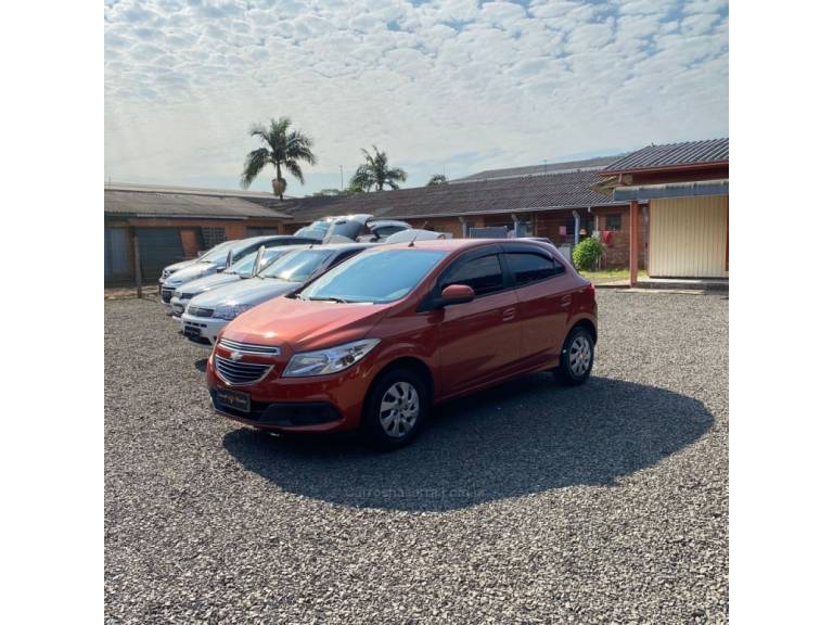 CHEVROLET - ONIX - 2013/2013 - Laranja - R$ 44.900,00