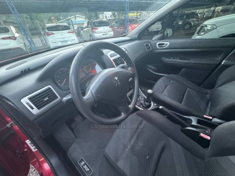 PEUGEOT - 307 - 2008/2009 - Vermelha - R$ 21.900,00