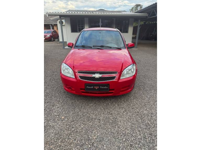 CHEVROLET - PRISMA - 2012/2012 - Vermelha - R$ 32.900,00