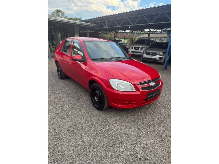 CHEVROLET - PRISMA - 2012/2012 - Vermelha - R$ 32.900,00