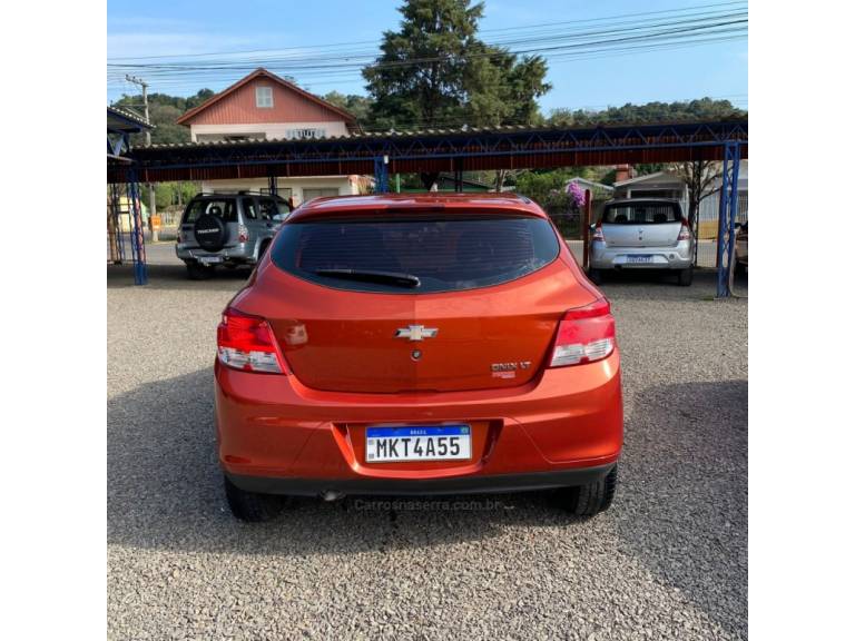CHEVROLET - ONIX - 2013/2013 - Laranja - R$ 44.900,00